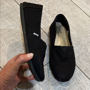 TOMS Black Canvas Slip-Ons